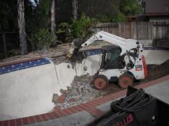 Pool Removal in progress from our Pool Demolition Experts